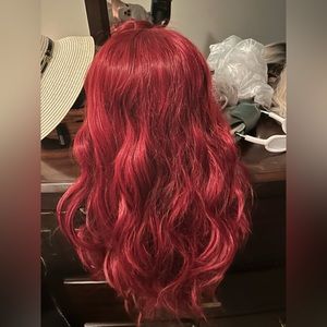Aerial red synthetic wig around 24” or longer in length